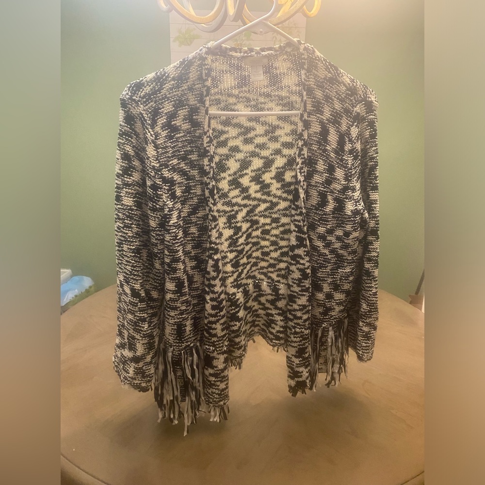 Sweater.  Fancy bottom. Great with white jeans.